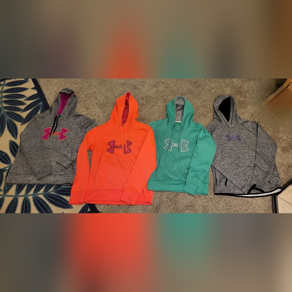 Four under armour hooded sweatshirts. Size M